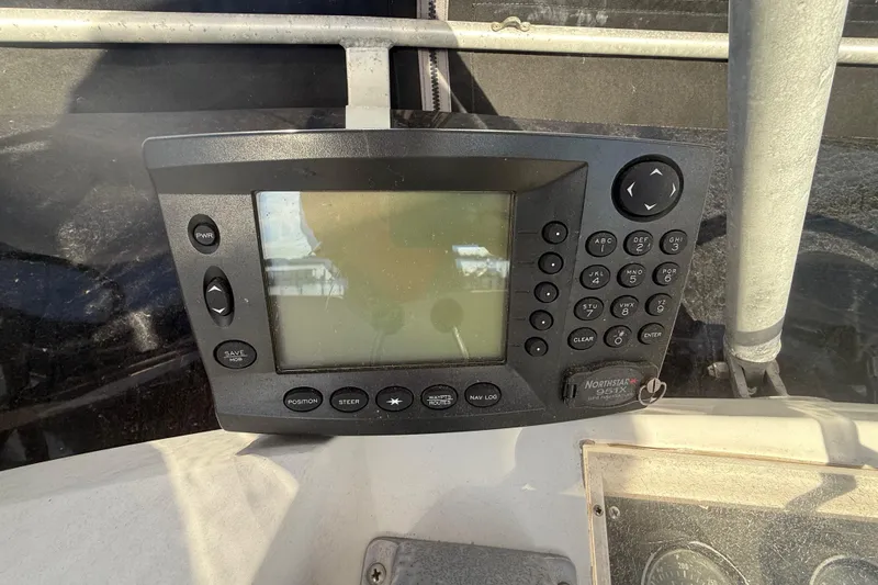 Slide: The Image of Northstar 951X GPS display on 1988 Phoenix 29 SFX Convertible boat. - 11