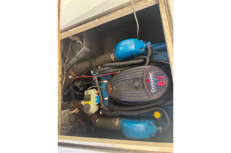 Slide: The Image of Engine compartment of 1988 Phoenix 29 SFX Convertible with Crusader 5.7 engine. - 17