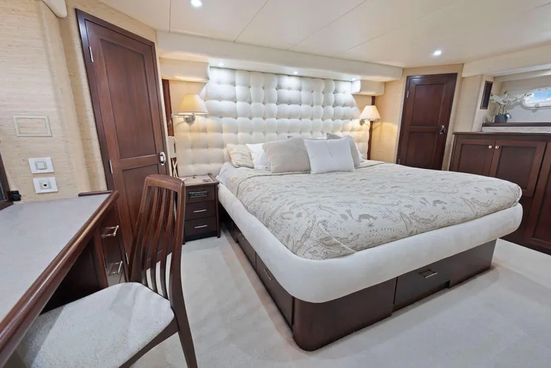 Slide: The Image of Luxurious bedroom interior of 1998 Pacific Mariner 65 yacht with elegant furnishings. - 37