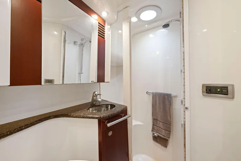 Slide: The Image of Luxurious bathroom in 2005 Sea Ray 420 Sedan Bridge yacht with modern fixtures. - 14