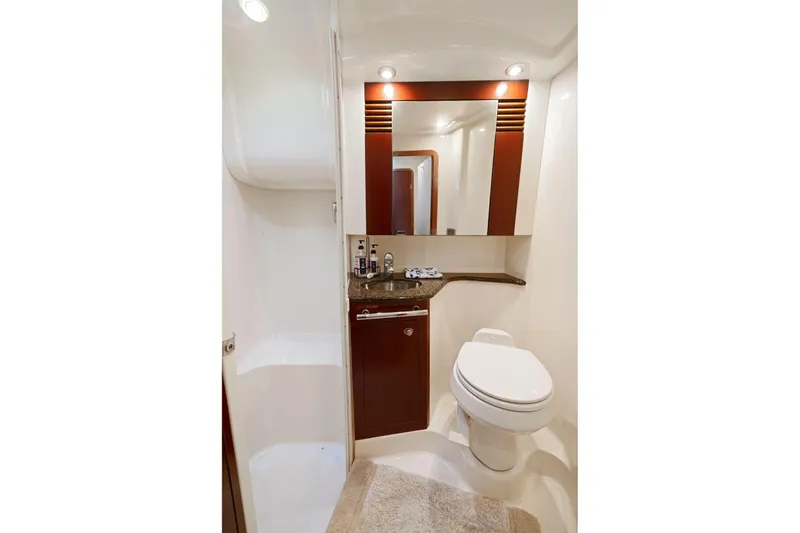 Slide: The Image of Luxurious bathroom in 2005 Sea Ray 420 Sedan Bridge yacht with modern fixtures. - 16