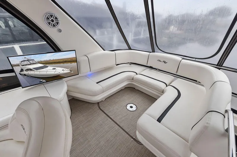Slide: The Image of Luxurious interior of 2005 Sea Ray 420 Sedan Bridge with plush seating and modern amenities. - 21