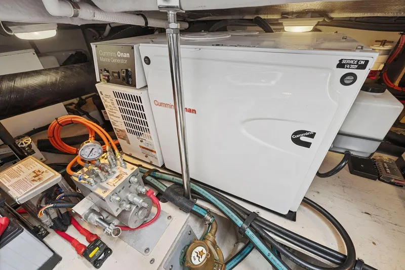 Slide: The Image of Cummins Onan marine generator in 2005 Sea Ray 420 Sedan Bridge engine room. - 23