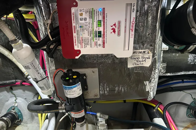 Slide: The Image of Engine room of 2004 Meridian 408 Motoryacht with electrical components and wiring. - 30