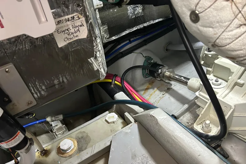 Slide: The Image of Engine room of 2004 Meridian 408 Motoryacht with wiring and mechanical components. - 31