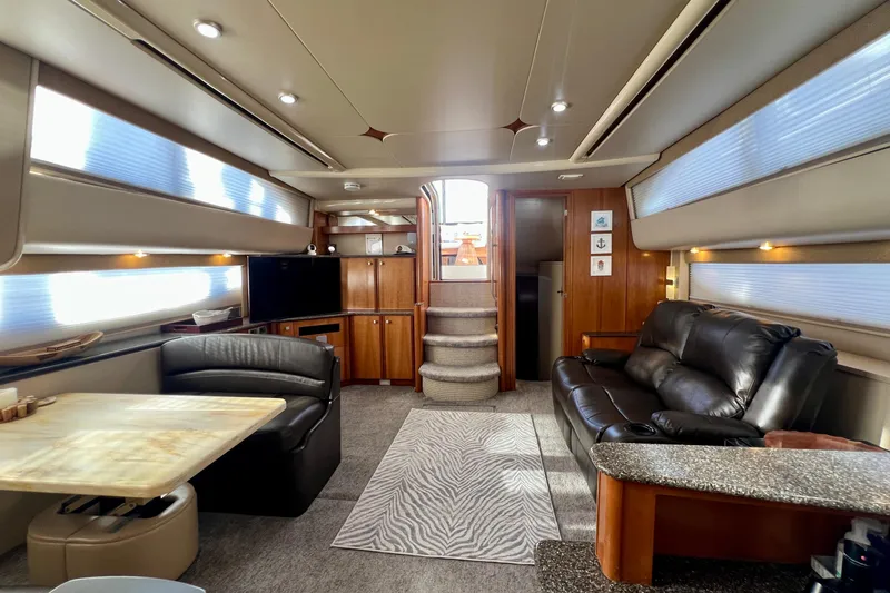 Slide: The Image of Luxurious interior of a 2004 Meridian 408 Motoryacht with leather seating and modern amenities. - 8