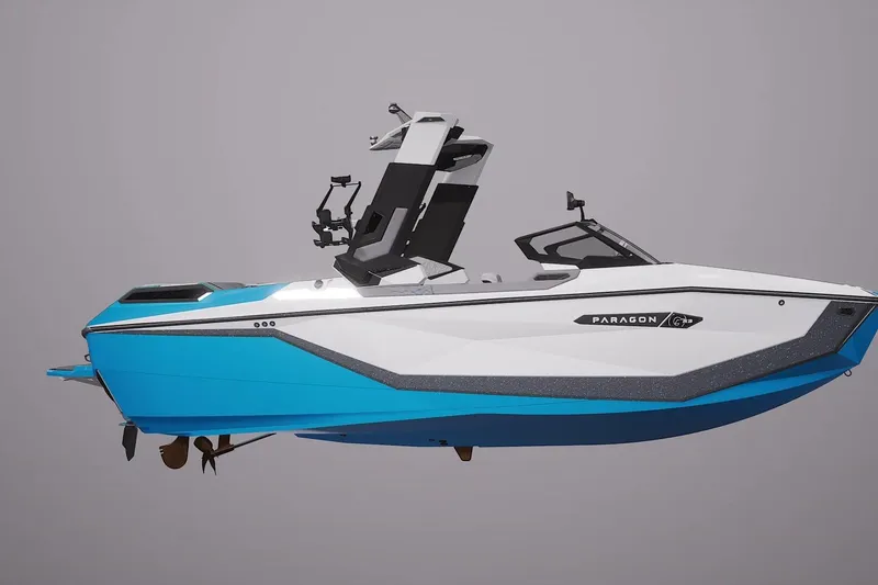 Slide: The Image of 2026 Nautique Super Air Nautique G23 Paragon boat, sleek design, blue and white color scheme. - 1