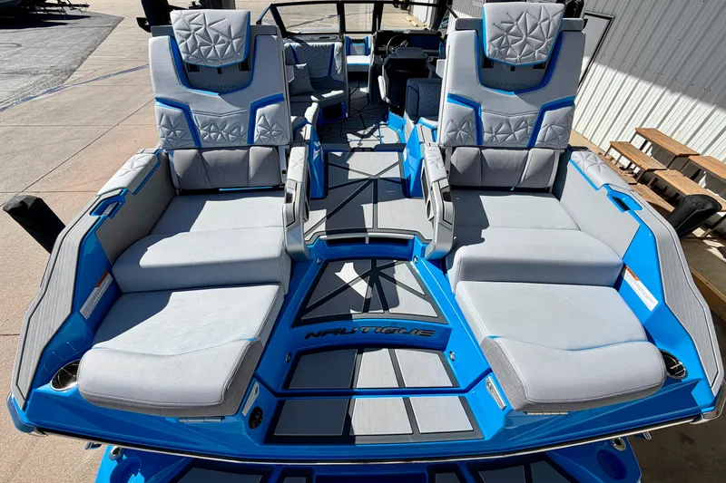 Slide: The Image of 2026 Nautique Super Air Nautique G23 Paragon boat with luxurious seating and modern design. - 14