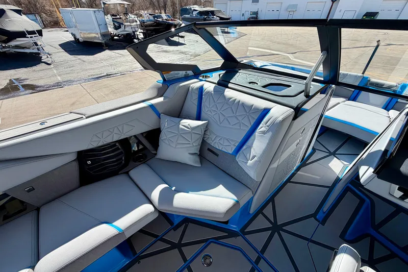 Slide: The Image of 2026 Nautique Super Air Nautique G23 Paragon interior with modern seating and geometric design. - 19
