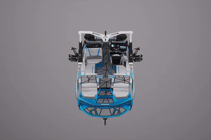 Slide: The Image of 2026 Nautique Super Air Nautique G23 Paragon, top view, sleek design, blue and white interior. - 2
