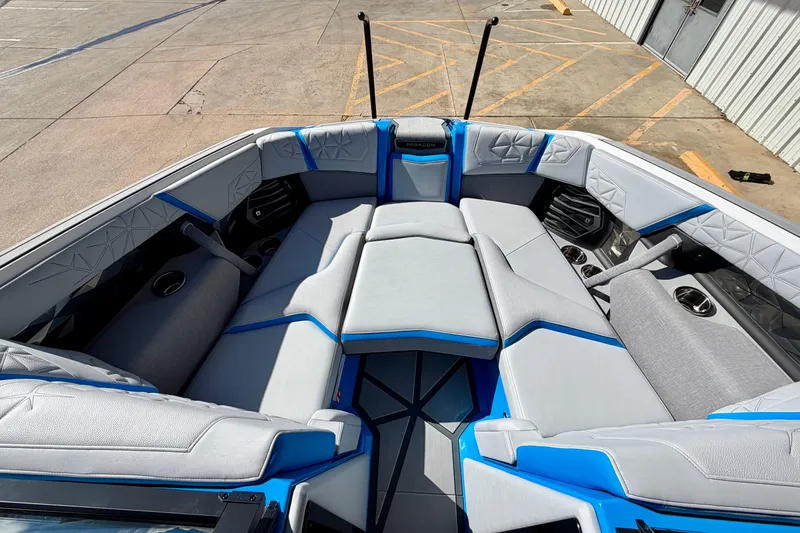 Slide: The Image of 2026 Nautique Super Air Nautique G23 Paragon boat interior with luxurious seating and cup holders. - 22