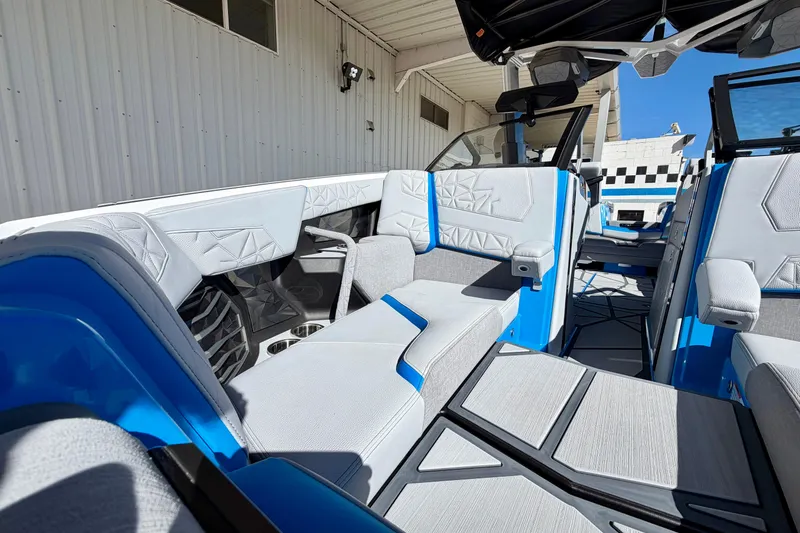 Slide: The Image of 2026 Nautique Super Air Nautique G23 Paragon interior with modern seating and sleek design. - 27