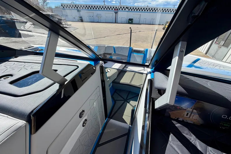Slide: The Image of Interior view of 2026 Nautique Super Air Nautique G23 Paragon boat, showcasing modern design elements. - 32