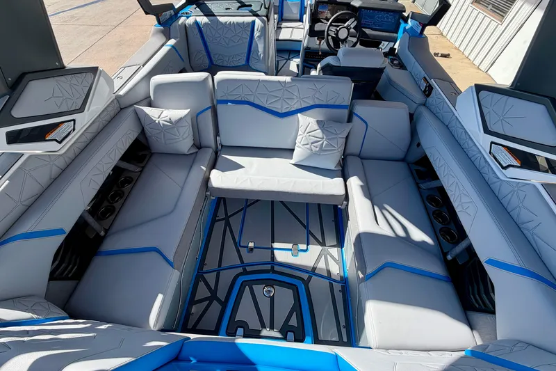 Slide: The Image of Interior of 2026 Nautique Super Air Nautique G23 Paragon boat, featuring luxurious seating. - 35