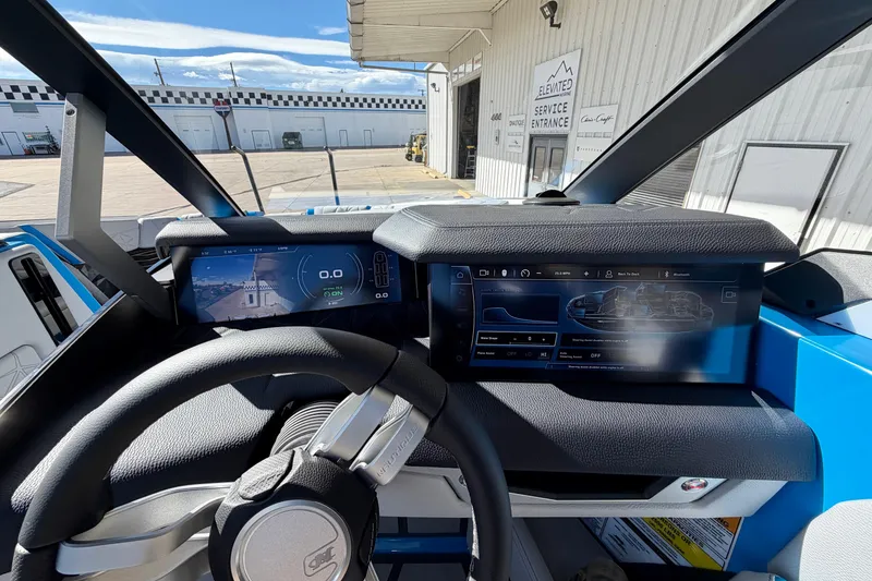 Slide: The Image of Interior dashboard of 2026 Nautique Super Air Nautique G23 Paragon boat. - 38