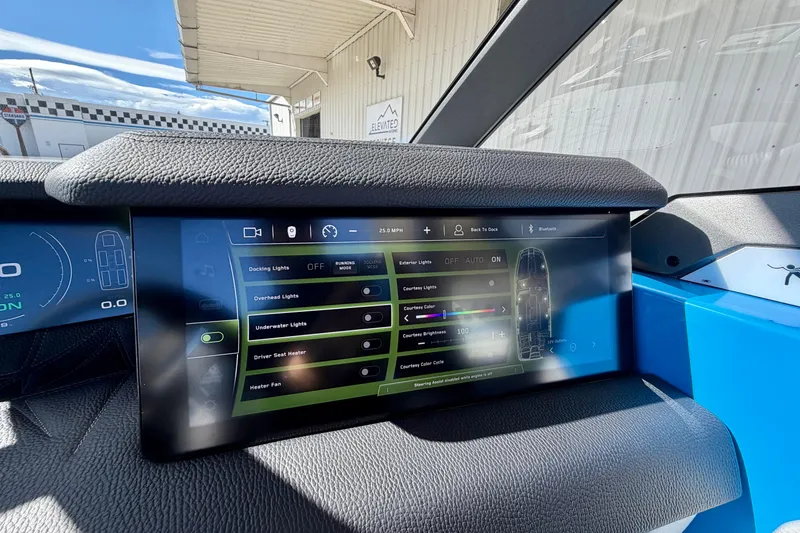 Slide: The Image of 2026 Nautique Super Air Nautique G23 Paragon touchscreen dashboard displaying lighting controls. - 39
