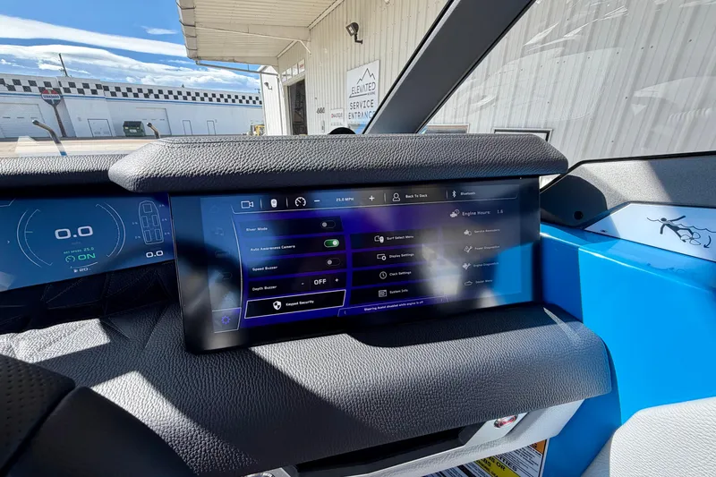 Slide: The Image of 2026 Nautique Super Air Nautique G23 Paragon dashboard with advanced touchscreen controls. - 41