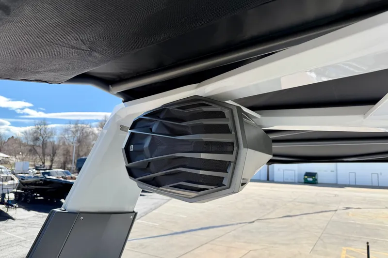 Slide: The Image of 2026 Nautique Super Air Nautique G23 Paragon boat speaker detail under canopy. - 45