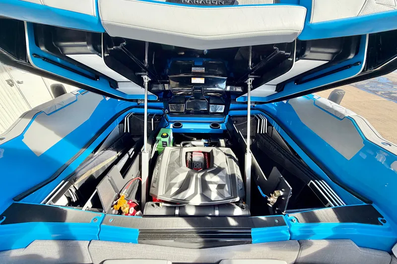 Slide: The Image of Engine compartment of 2026 Nautique Super Air Nautique G23 Paragon boat. - 48