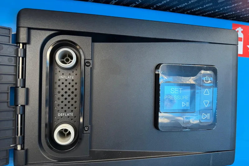 Slide: The Image of Control panel of 2026 Nautique Super Air Nautique G23 Paragon with inflate and deflate options. - 50