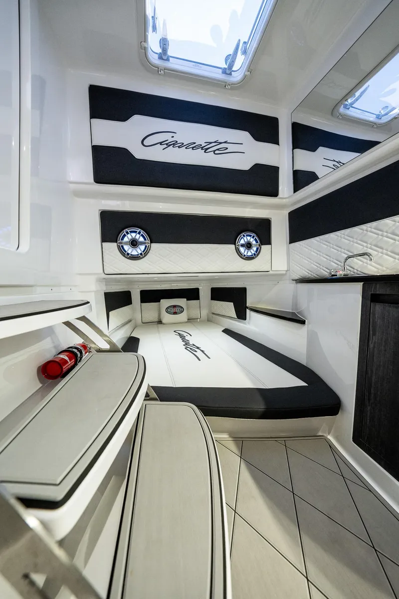 Slide: The Image of 2022 Cigarette 41 Nighthawk interior cabin with modern design and comfortable seating. - 15