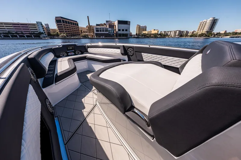 Slide: The Image of 2022 Cigarette 41 Nighthawk boat interior with luxurious seating and waterfront view. - 4