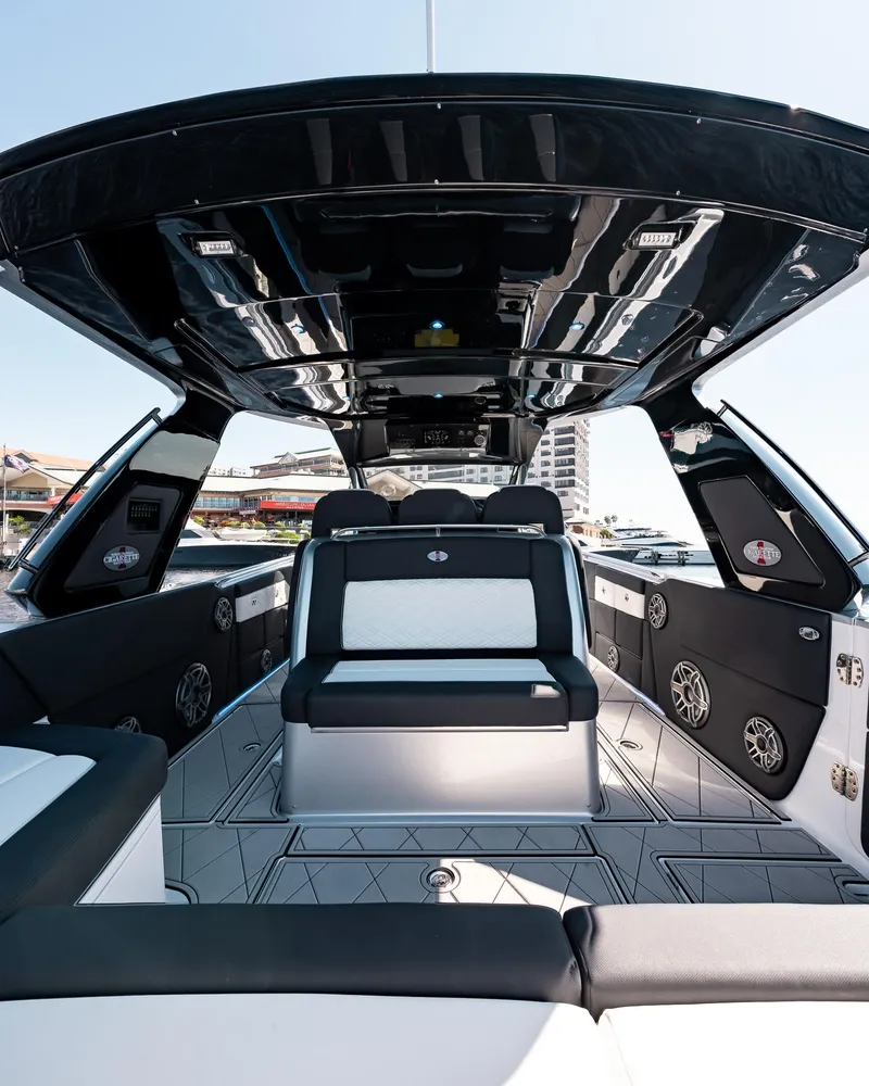 Slide: The Image of 2022 Cigarette 41 Nighthawk luxury boat interior with modern seating and sleek design. - 7