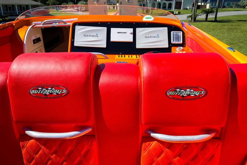 Slide: The Image of Red interior of 2005 Outerlimits 51 Sport Yacht with Garmin navigation displays. - 14