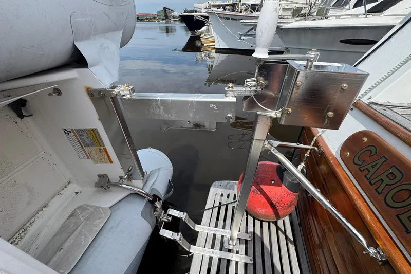 Slide: The Image of 1989 Grand Banks 42 Motor Yacht with dinghy davit system at marina. - 24