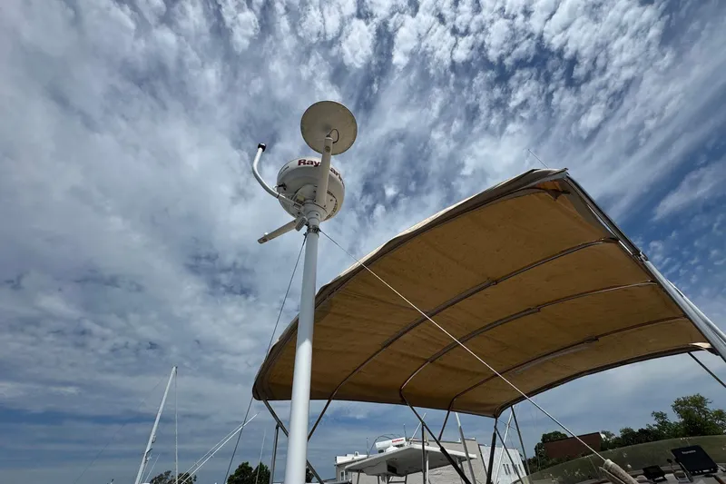 Slide: The Image of Radar equipment on 1989 Grand Banks 42 Motor Yacht under cloudy sky. - 35