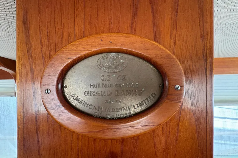 Slide: The Image of Plaque on 1989 Grand Banks 42 Motor Yacht, displaying hull number and manufacturer details. - 38