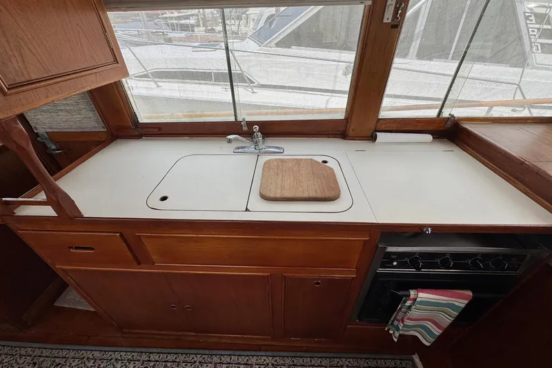 Slide: The Image of Galley kitchen in 1989 Grand Banks 42 Motor Yacht with sink and stove. - 51