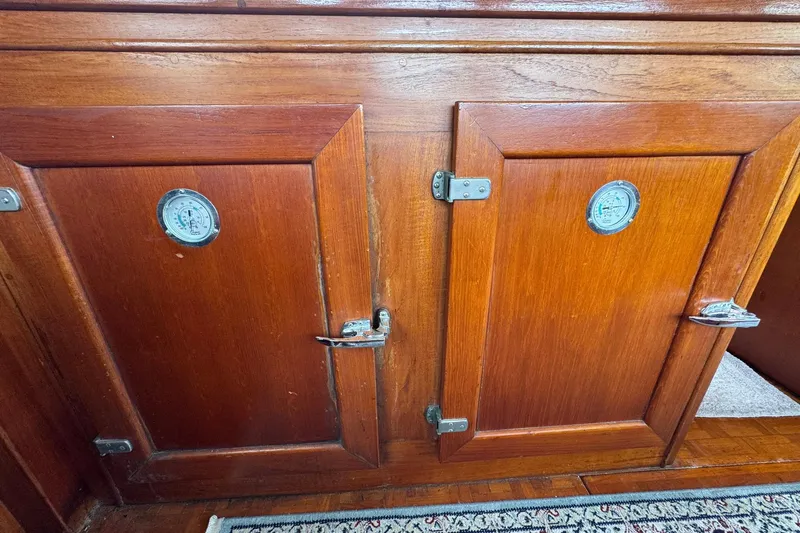 Slide: The Image of Wooden cabinet doors on a 1989 Grand Banks 42 Motor Yacht interior. - 55