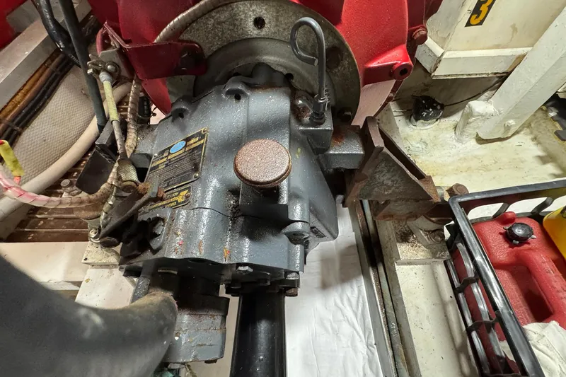 Slide: The Image of Engine compartment of a 1989 Grand Banks 42 Motor Yacht, showcasing mechanical components. - 89