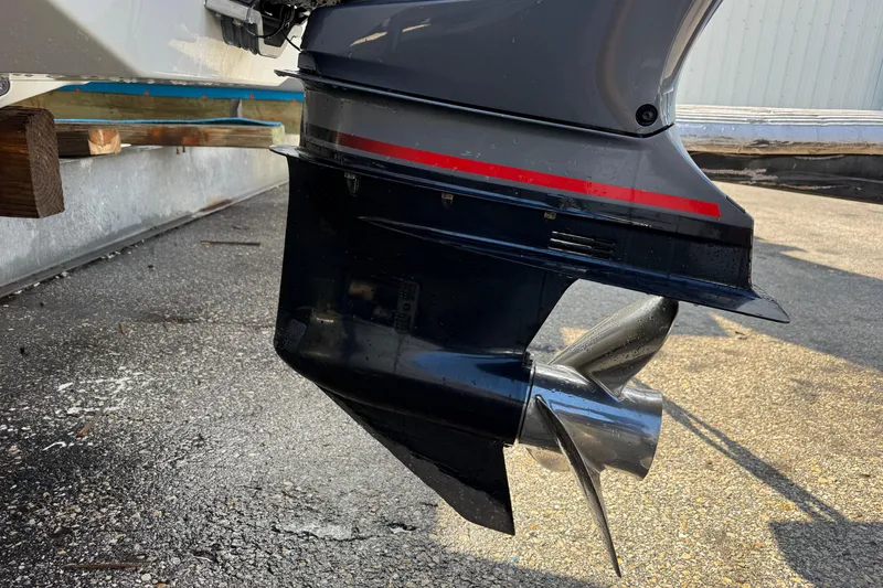 Slide: The Image of 2018 Crownline Eclipse E24 XS boat with Yamaha 250 engine in storage. - 12