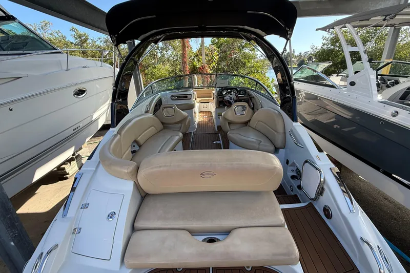 Slide: The Image of 2018 Crownline Eclipse E24 XS boat with Yamaha 250 outboard motor, featuring teak-style decking. - 16