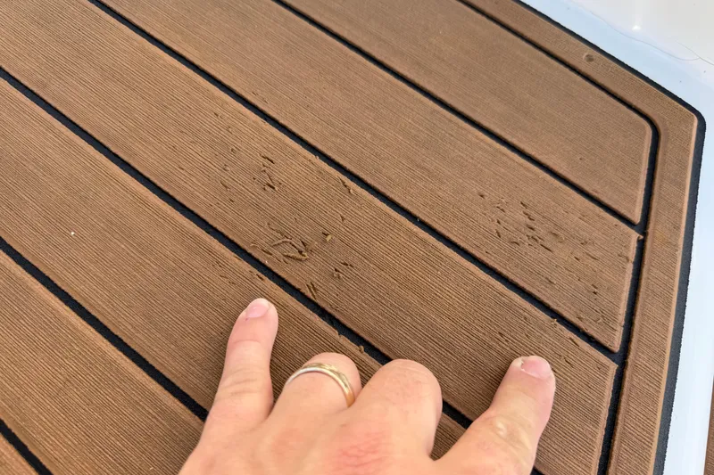 Slide: The Image of Open storage compartment in 2018 Crownline Eclipse E24 XS boat. - 20