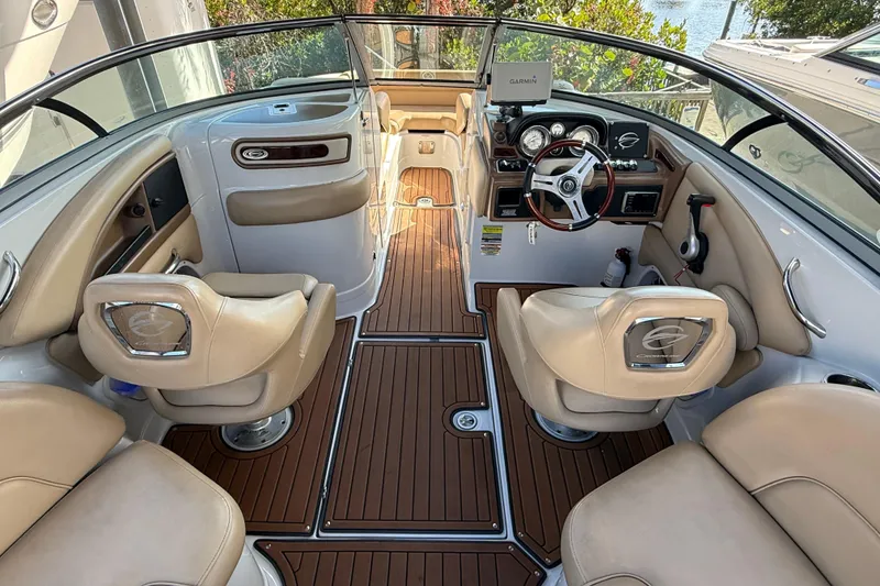Slide: The Image of Speaker and cup holders on 2018 Crownline Eclipse E24 XS boat seat. - 28