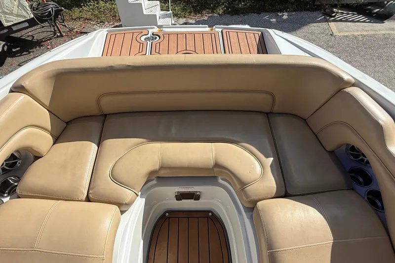 Slide: The Image of Close-up of a crack on a 2018 Crownline Eclipse E24 XS boat surface. - 61