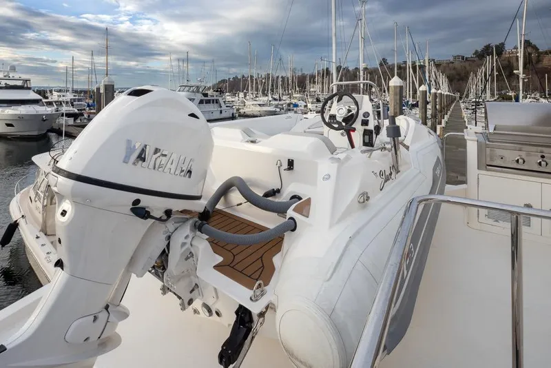 Slide: The Image of 2015 Hampton motor yacht with Yamaha engine at marina, featuring sleek design and modern amenities. - 68