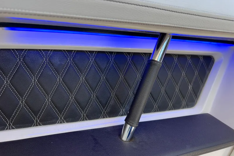 Slide: The Image of 2019 Sea Ray SLX 310 Outboard interior with luxurious seating and modern design. - 39