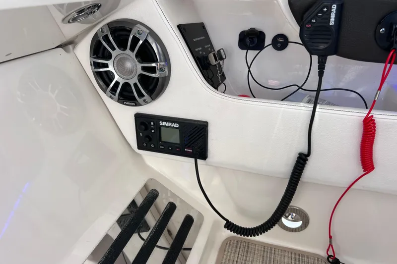 Slide: The Image of Joystick control on 2019 Sea Ray SLX 310 Outboard boat, featuring Skyhook and adjust buttons. - 52