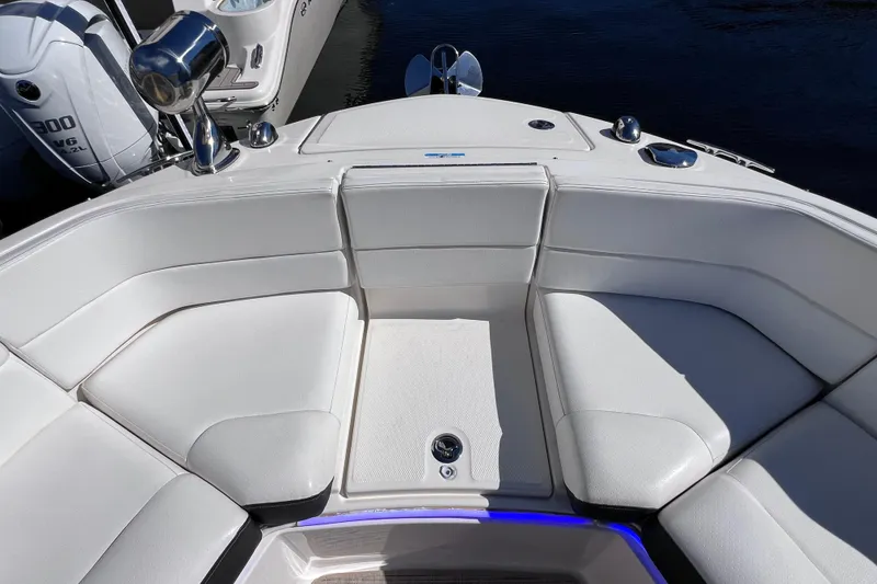 Slide: The Image of 2019 Sea Ray SLX 310 Outboard boat with luxurious white seating and sleek design. - 66