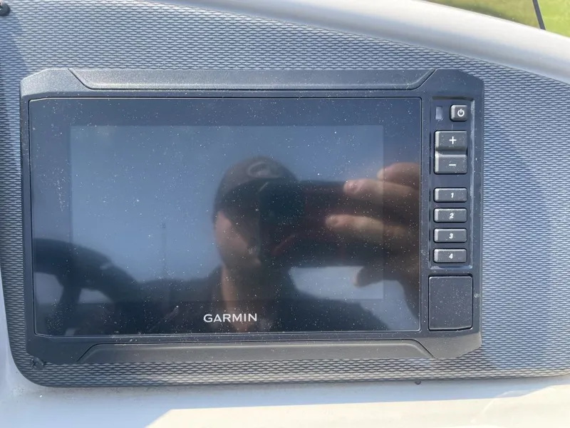 Slide: The Image of A Garmin navigation system is integrated into the dashboard of a Starcraft boat. - 9