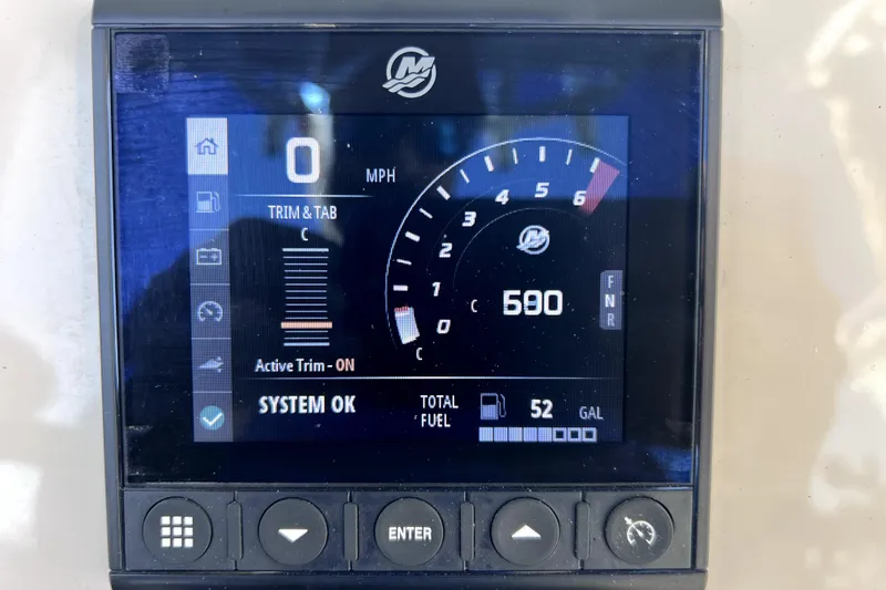 Slide: The Image of 2023 Boston Whaler 220 Dauntless helm with Simrad electronics and Mercury controls. - 30