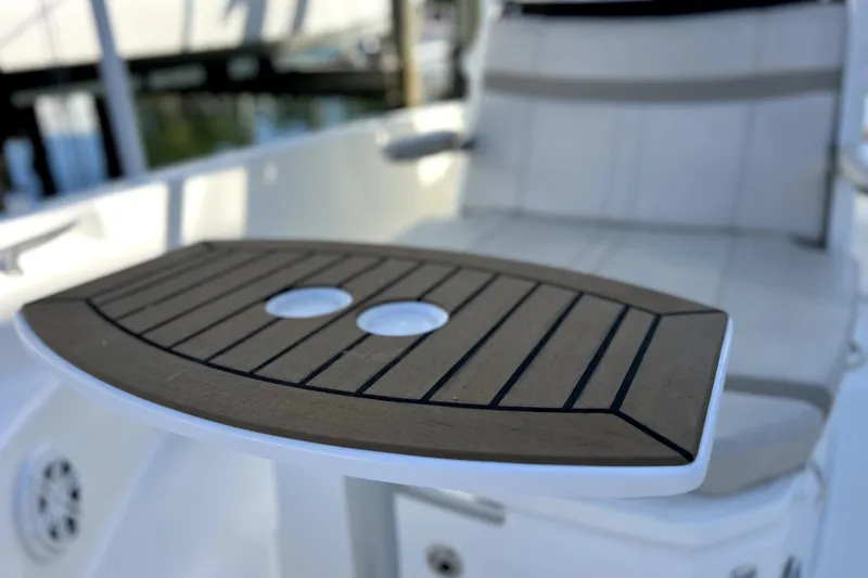 Slide: The Image of 2023 Boston Whaler 220 Dauntless interior with storage and equipment. - 44