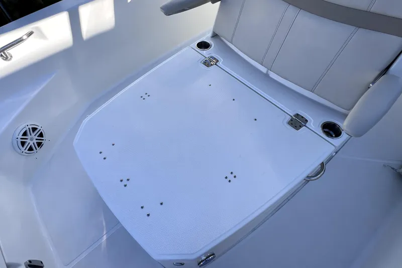 Slide: The Image of 2023 Boston Whaler 220 Dauntless boat detail against clear blue sky. - 49