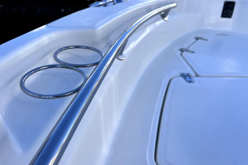 Slide: The Image of Red LED light on 2023 Boston Whaler 220 Dauntless boat's mesh canopy. - 51