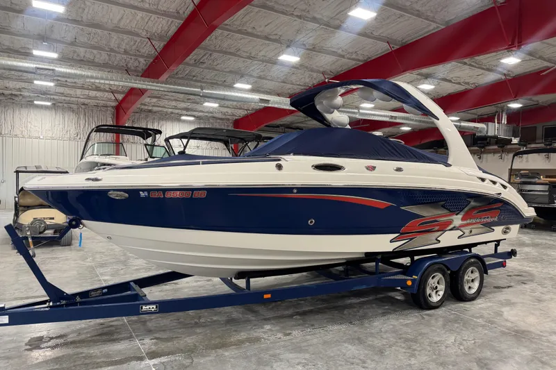 Slide: The Image of 2007 Chaparral 256 SSi boat on trailer in indoor storage facility. - 5