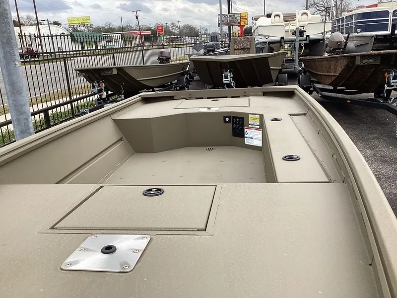 Slide: The Image of Open storage compartment in G3 Gator Tough 15 DK boat, year 2026. - 18